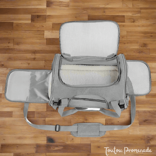 Vue latérale du sac DogCarrierBag gris montrant la ventilation sur 3 côtés